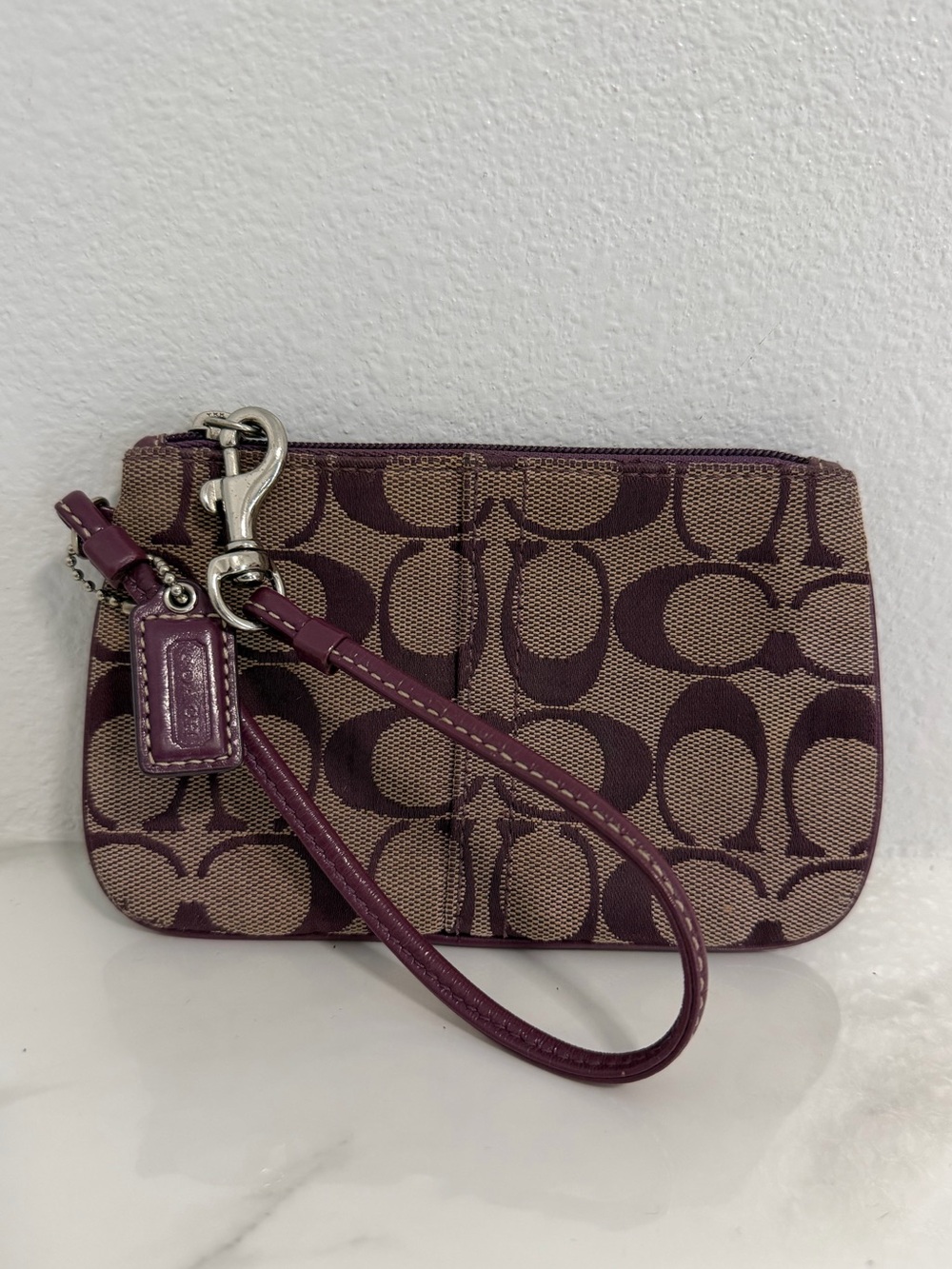 Coach Corner zip Wristlet in signature Denim purple